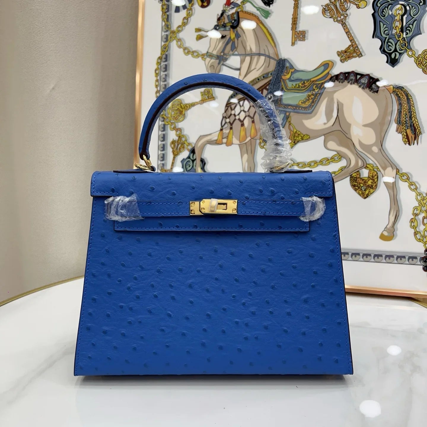 Soft Bleuet Blue Dot Textured Handbag With Gold Turn Lock and Detachable Shoulder Strap