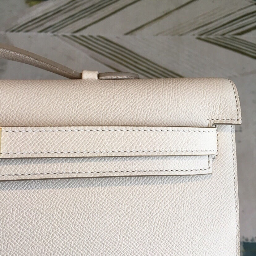 Creamy White Slim Evening Clutch With Gold Plated Turn Lock and Mini Top Handle