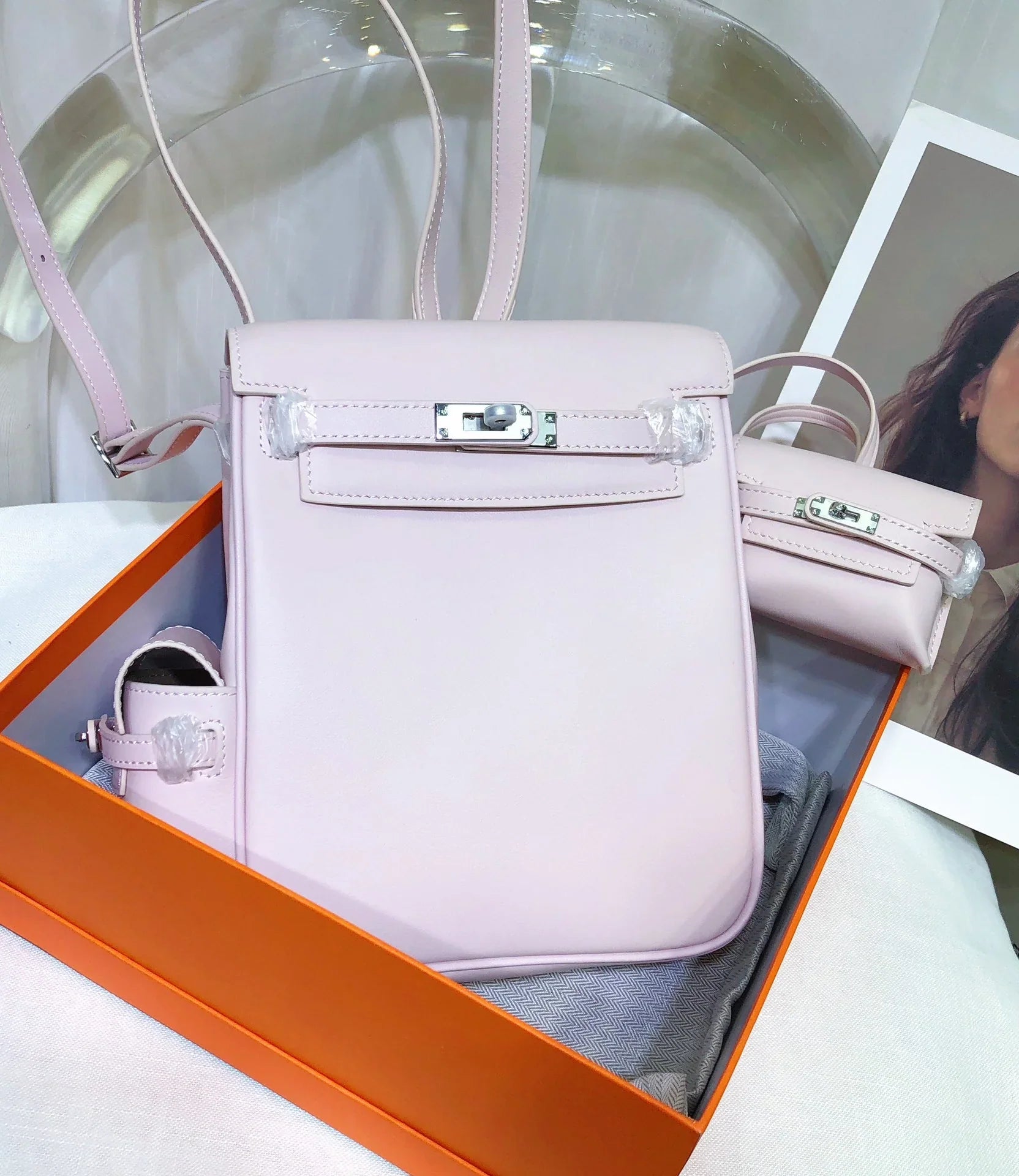 Pale Mauve Pink Mini Flip Backpack With Silver Turn Lock and Adjustable Shoulder Straps