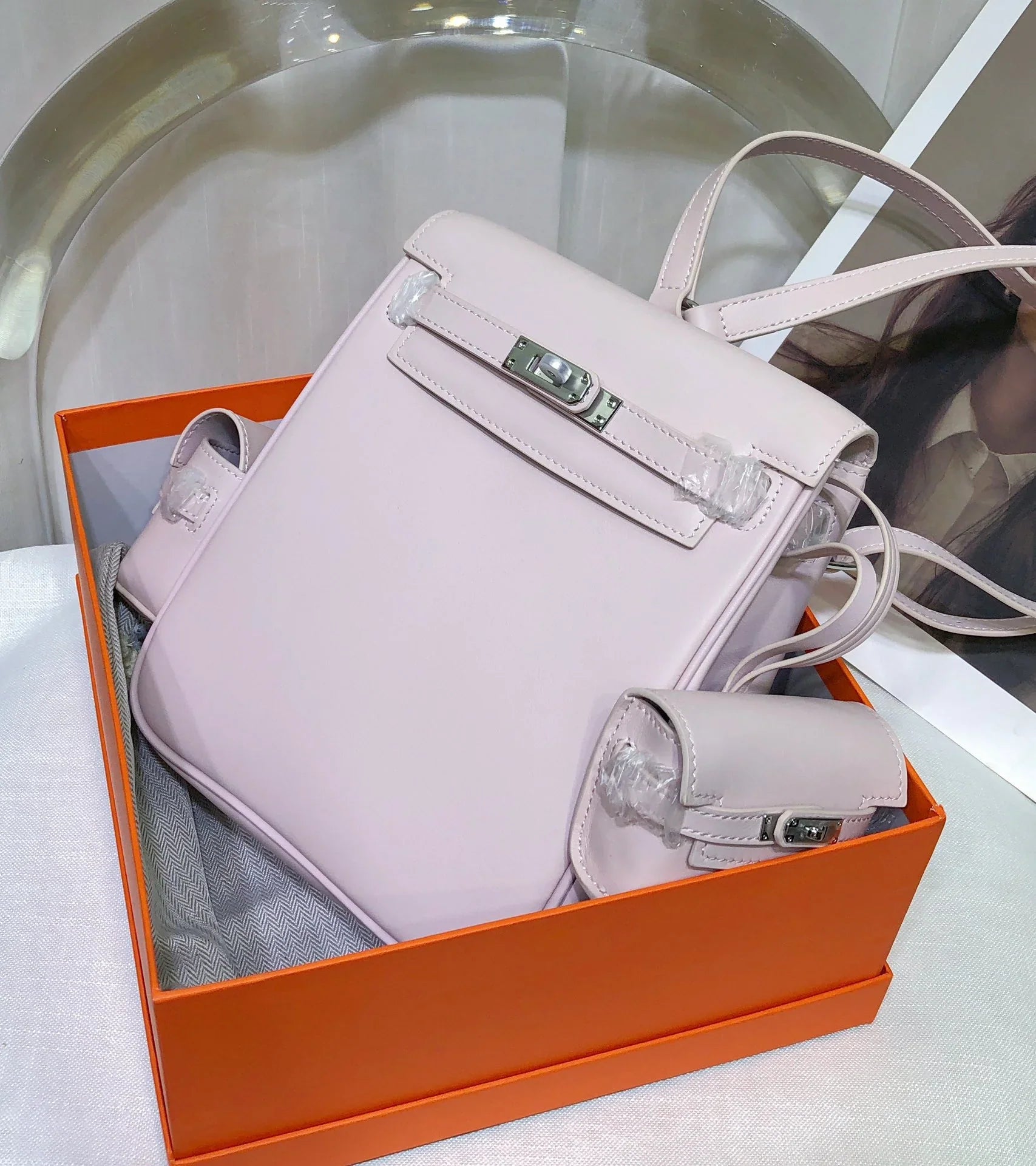 Pale Mauve Pink Mini Flip Backpack With Silver Turn Lock and Adjustable Shoulder Straps