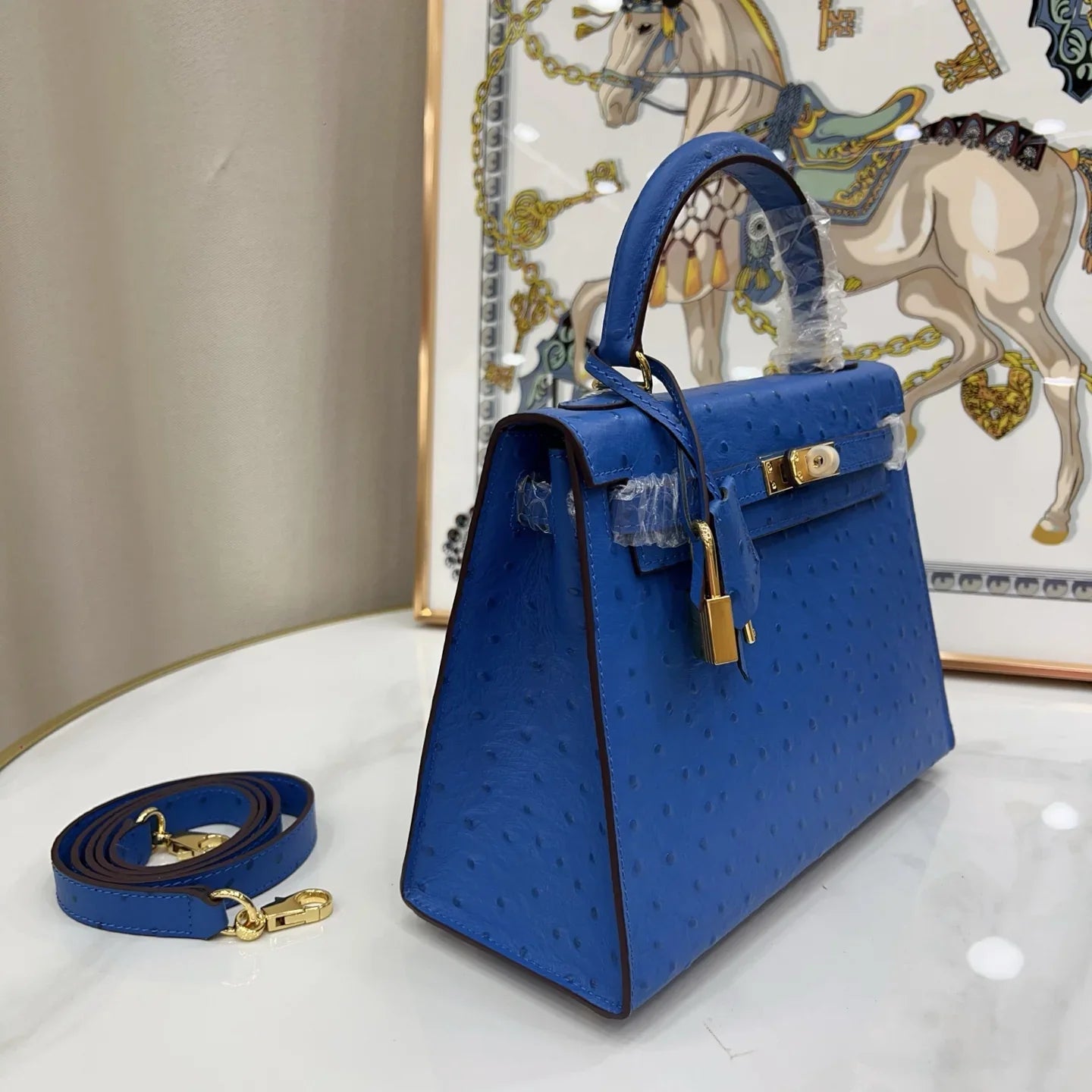 Soft Bleuet Blue Dot Textured Handbag With Gold Turn Lock and Detachable Shoulder Strap