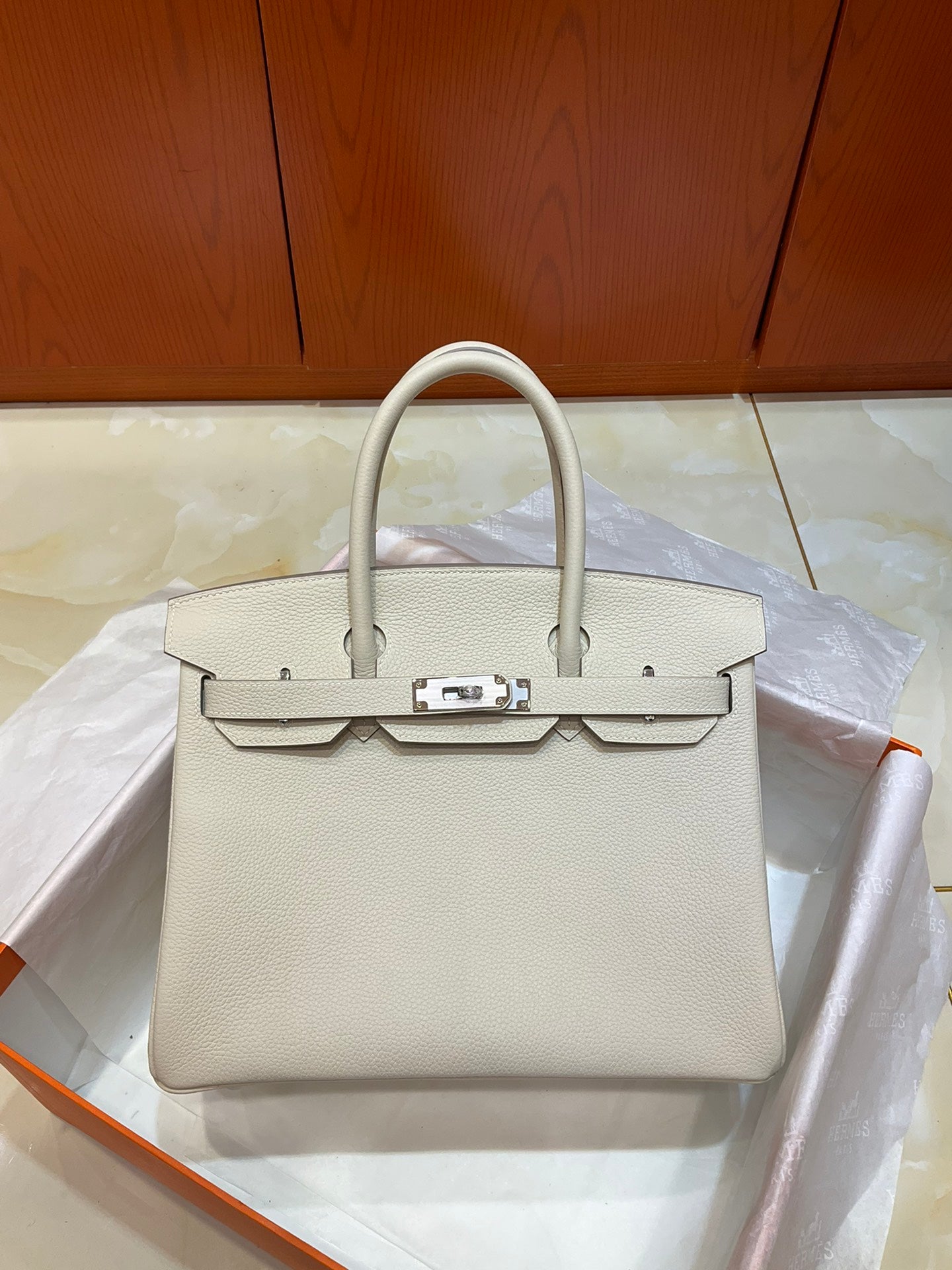Milkshake White Structured Handbag With Silver Plated Turn Lock and Dual Rolled Top Handles