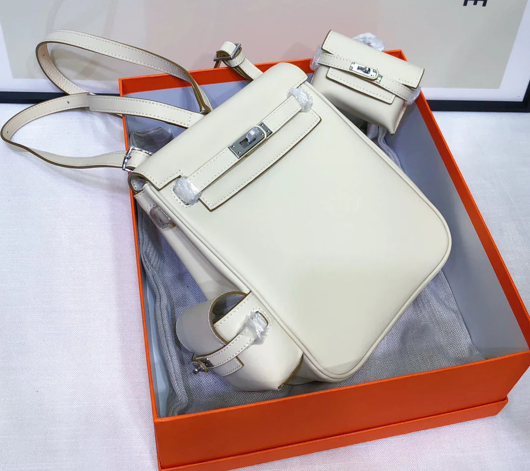 Pure White Mini Flip Backpack With Silver Tone Turn Lock and Adjustable Shoulder Straps