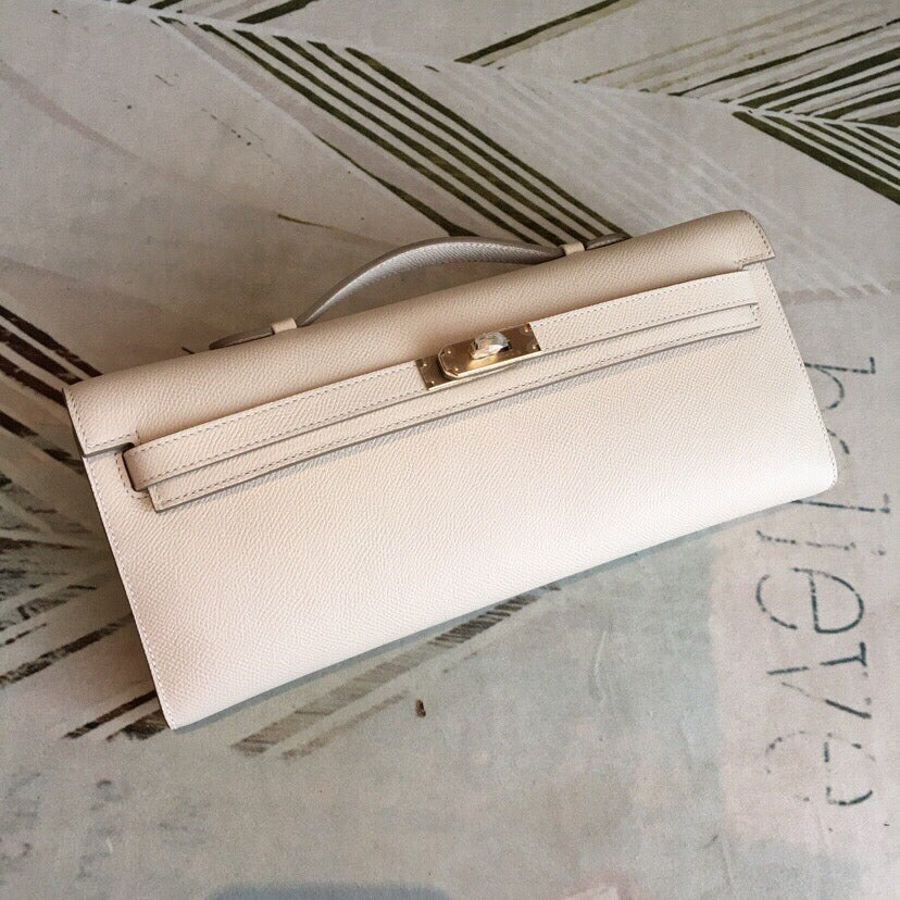 Creamy White Slim Evening Clutch With Gold Plated Turn Lock and Mini Top Handle