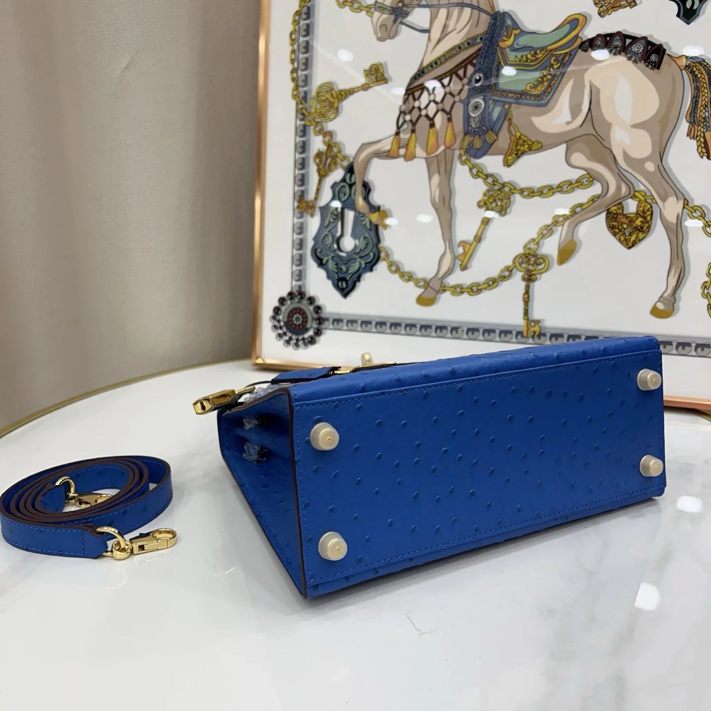 Soft Bleuet Blue Dot Textured Handbag With Gold Turn Lock and Detachable Shoulder Strap
