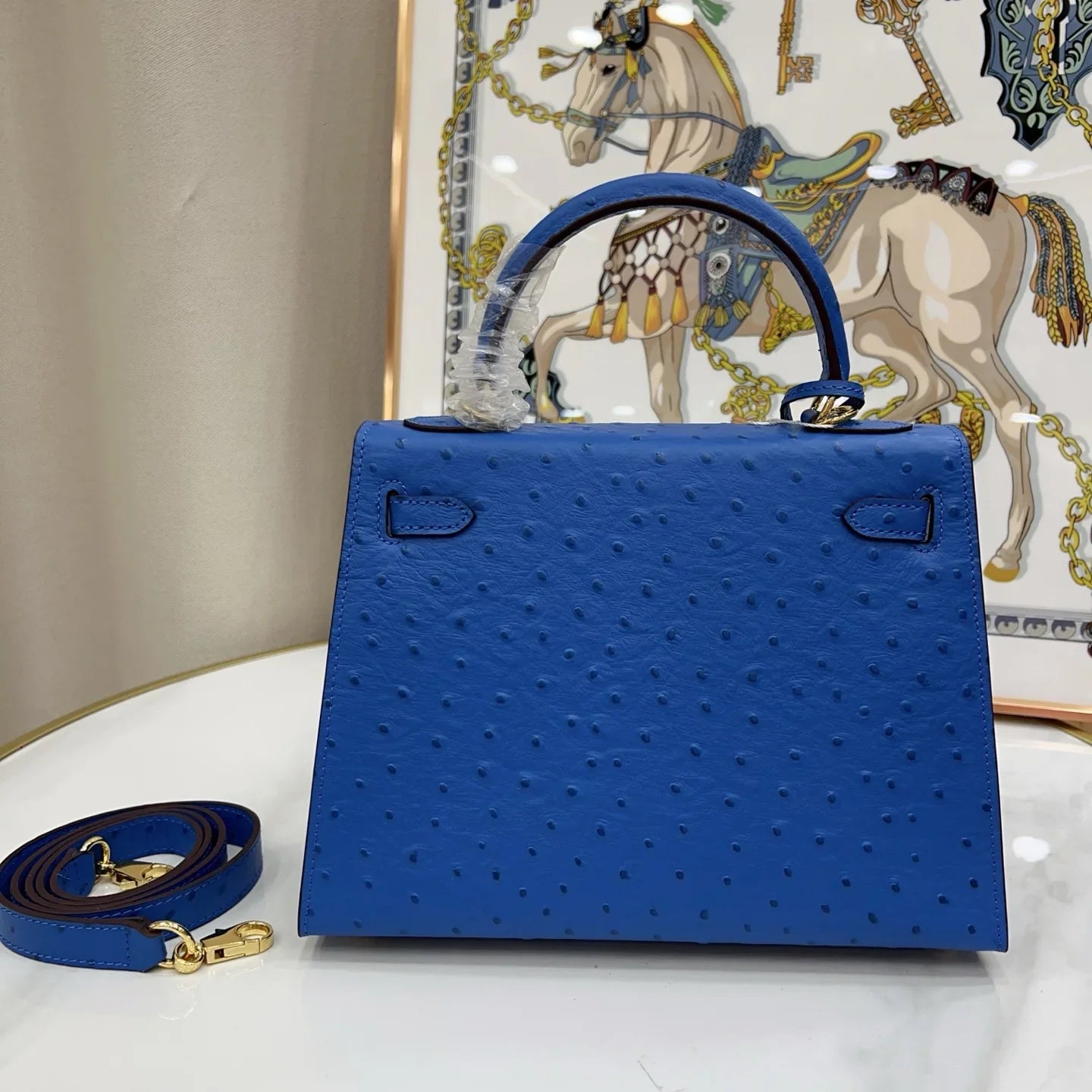 Soft Bleuet Blue Dot Textured Handbag With Gold Turn Lock and Detachable Shoulder Strap