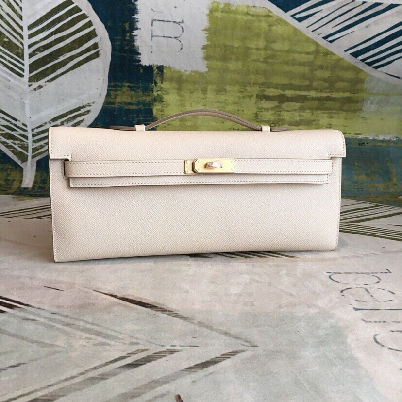 Creamy White Slim Evening Clutch With Gold Plated Turn Lock and Mini Top Handle